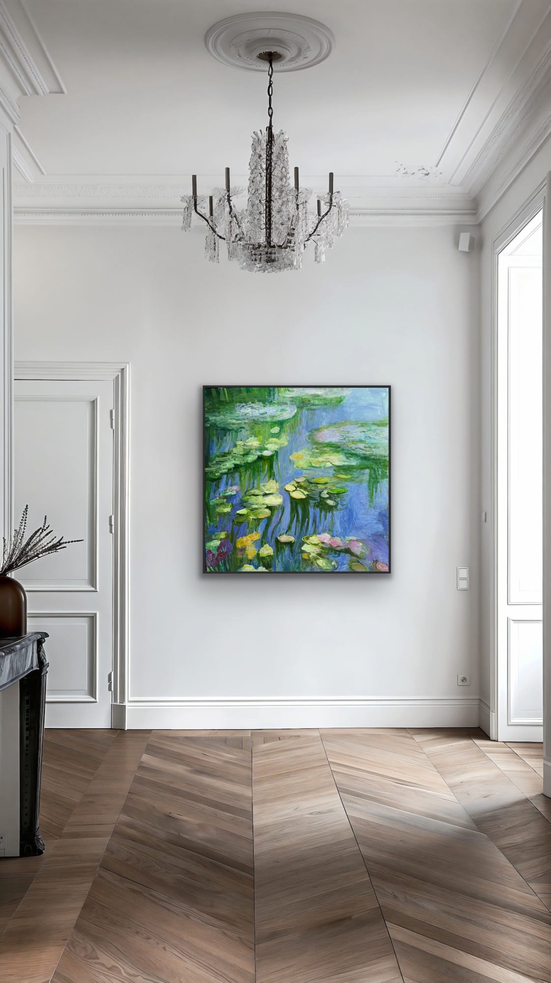 "Water Lily Pond" 48×48 original acrylic painting by Maria-Victoria Checa in a black float frame in an elegant Parisian-style entryway with crystal chandelier and herringbone wood floors — large impressionist art by Checa Art.