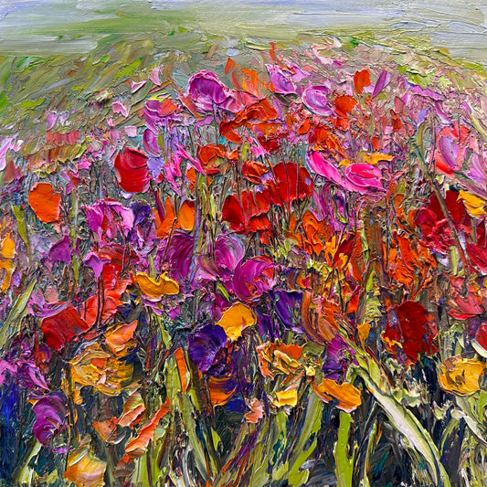 Painting of wild flowers in reds and purples.