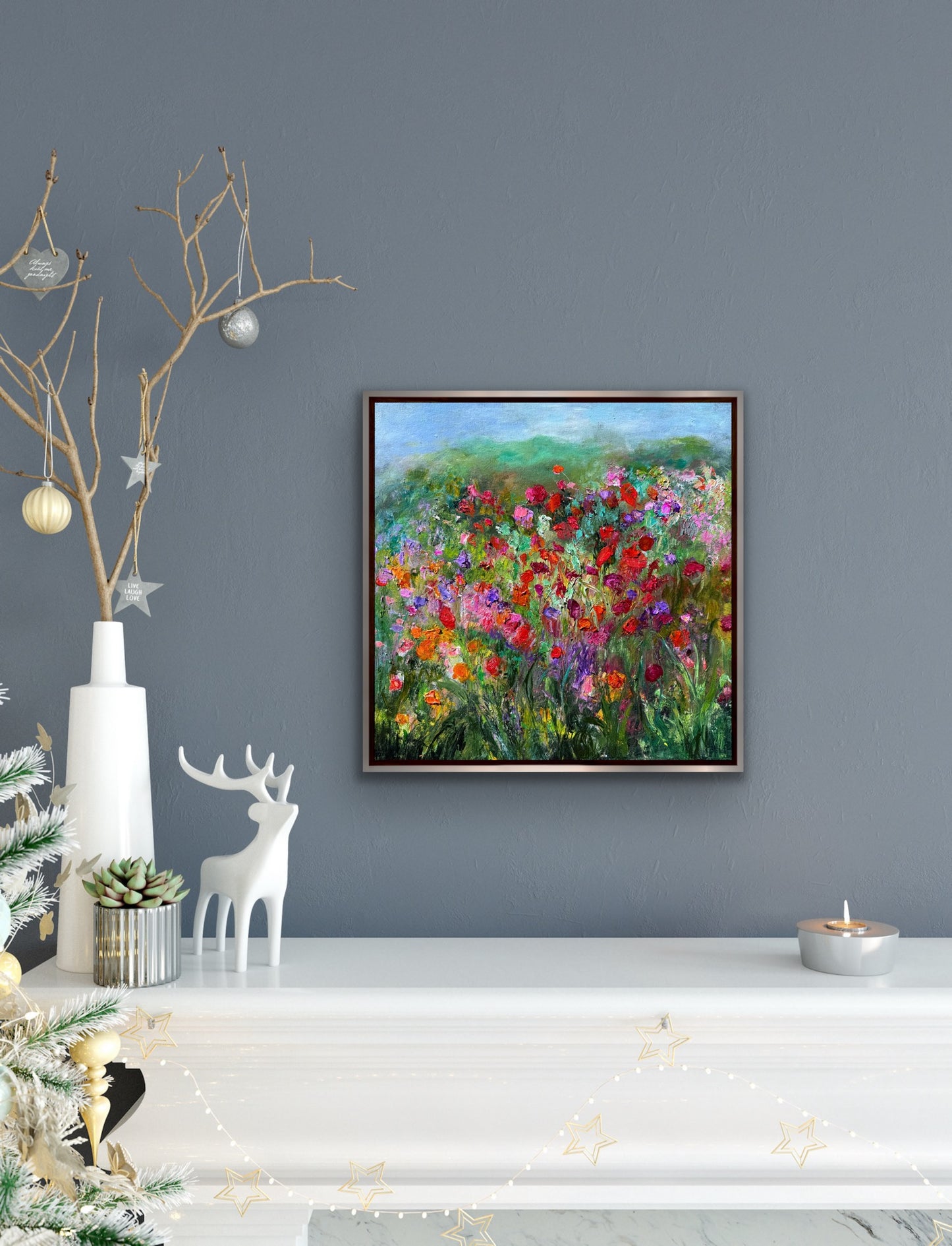Impressionist landscape painting by Maria-Victoria Checa displayed above a mantel.