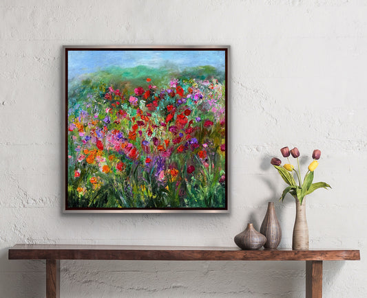 Impressionist landscape painting by Maria-Victoria Checa displayed in a contemporary interior with a vase of tulips