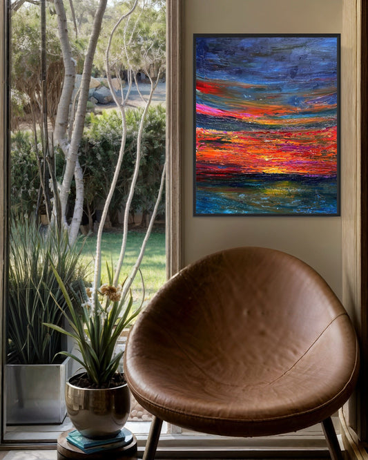 Fiery Sunset abstract sunset painting by Maria-Victoria Checa displayed in a modern living room interior