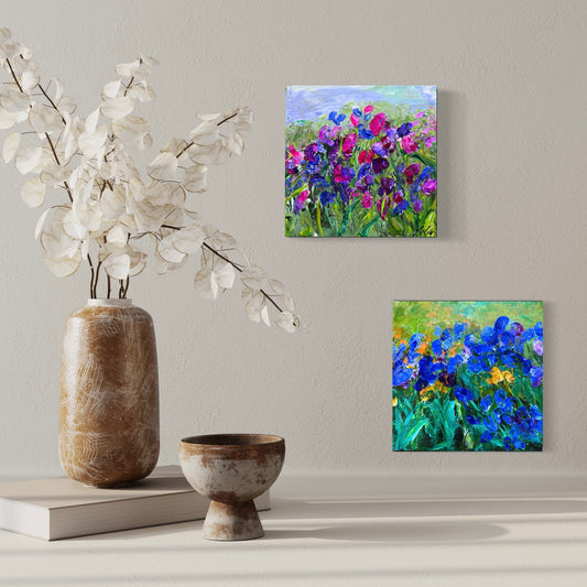 Two abstract impressionist acrylic painting of flowers sold together shown in a room, created in Washington, DC by Maria-Victoria Checa 