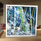 Blue Winter Forest Greeting Card — 5×5 abstract painting of navy tree trunks with vivid green accents and white snow spatters, by Washington DC artist Maria-Victoria Checa
