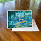 Water lily pond greeting card with luminous teal reflections and yellow and pink lilies — impressionist landscape art card by Maria-Victoria Checa