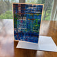 Blue and green abstract painting greeting card with layered brushwork in cobalt, crimson and white — 5x7 art card by Maria-Victoria Checa