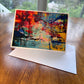 Fiery red and teal abstract painting greeting card with bold palette knife texture — horizontal format art card by Maria-Victoria Checa