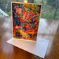 Energetic multicolor abstract painting greeting card with red, orange, blue and yellow gestural brushwork — art card by Washington DC artist Maria-Victoria Checa