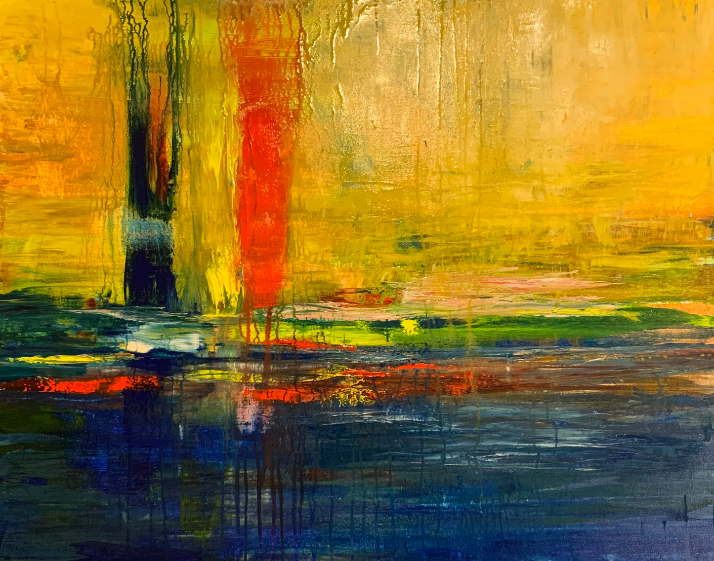 Abstract acrylic painting in tones of yellows and dark blues with touches of red.