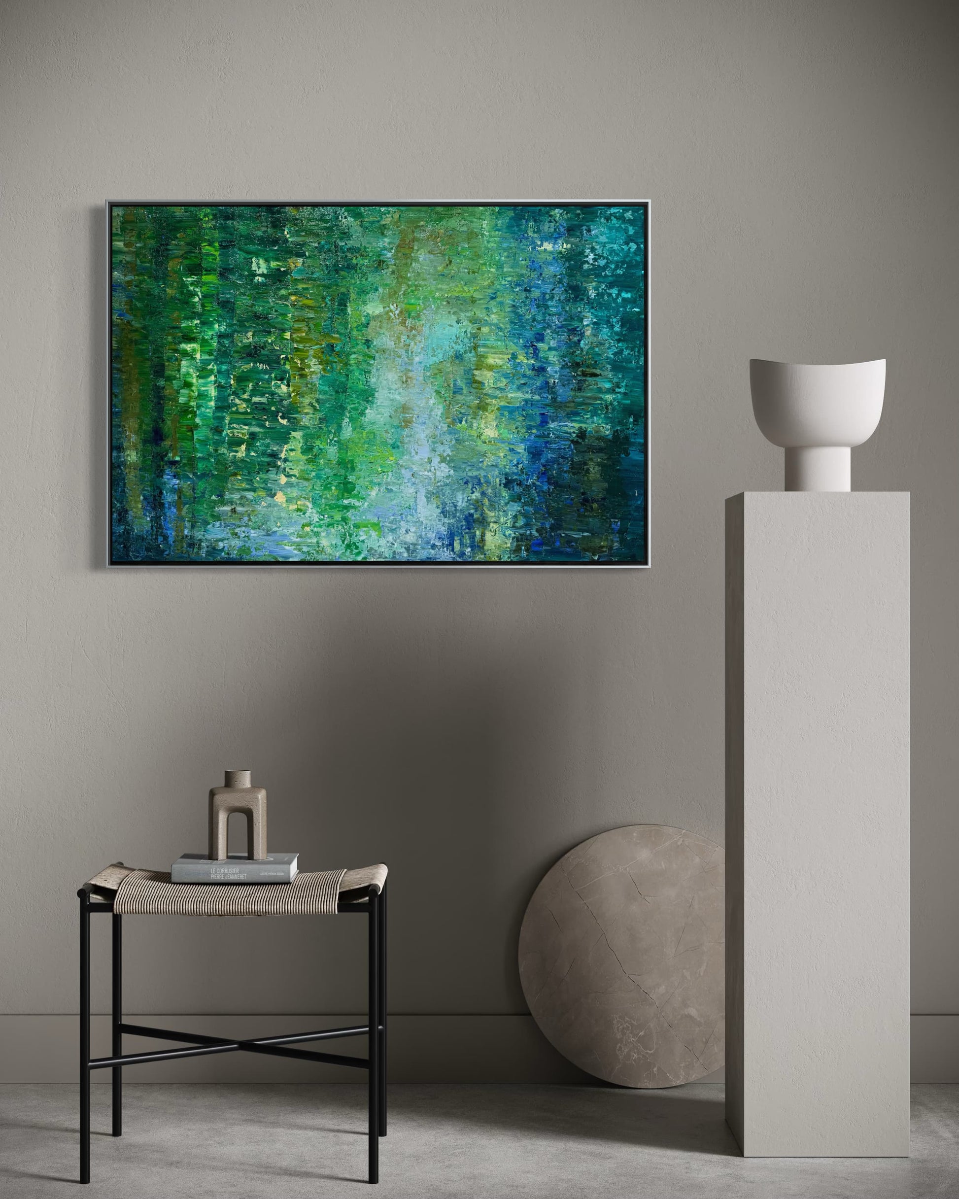 Water Reflection abstract oil painting by Maria-Victoria Checa in a silver float frame displayed on a warm neutral wall above a woven bench in a minimalist modern interior
