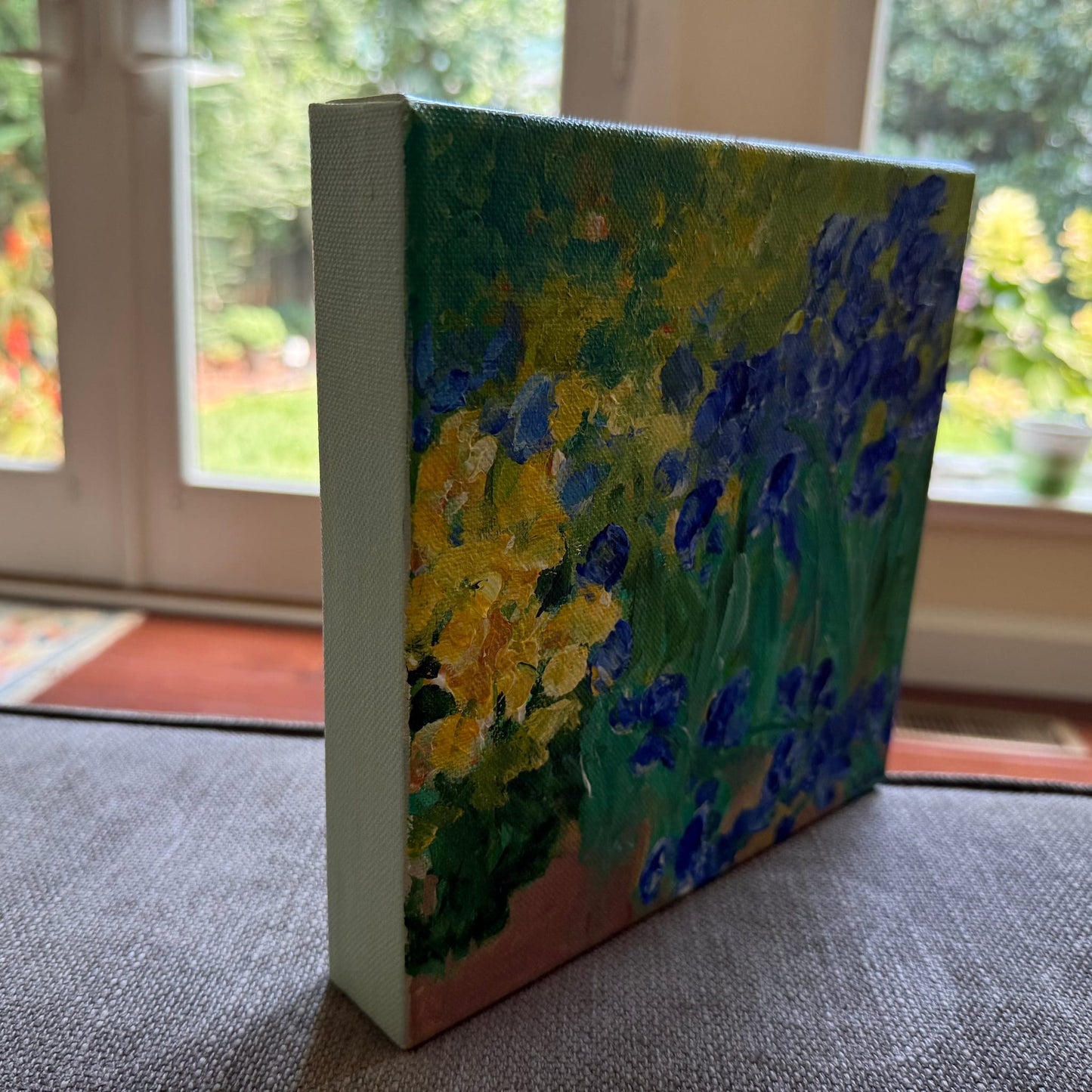 Side angle view of Blue Iris Meadow original acrylic painting showing canvas edge and texture, by Maria-Victoria Checa, Miniature Impressions No. 6