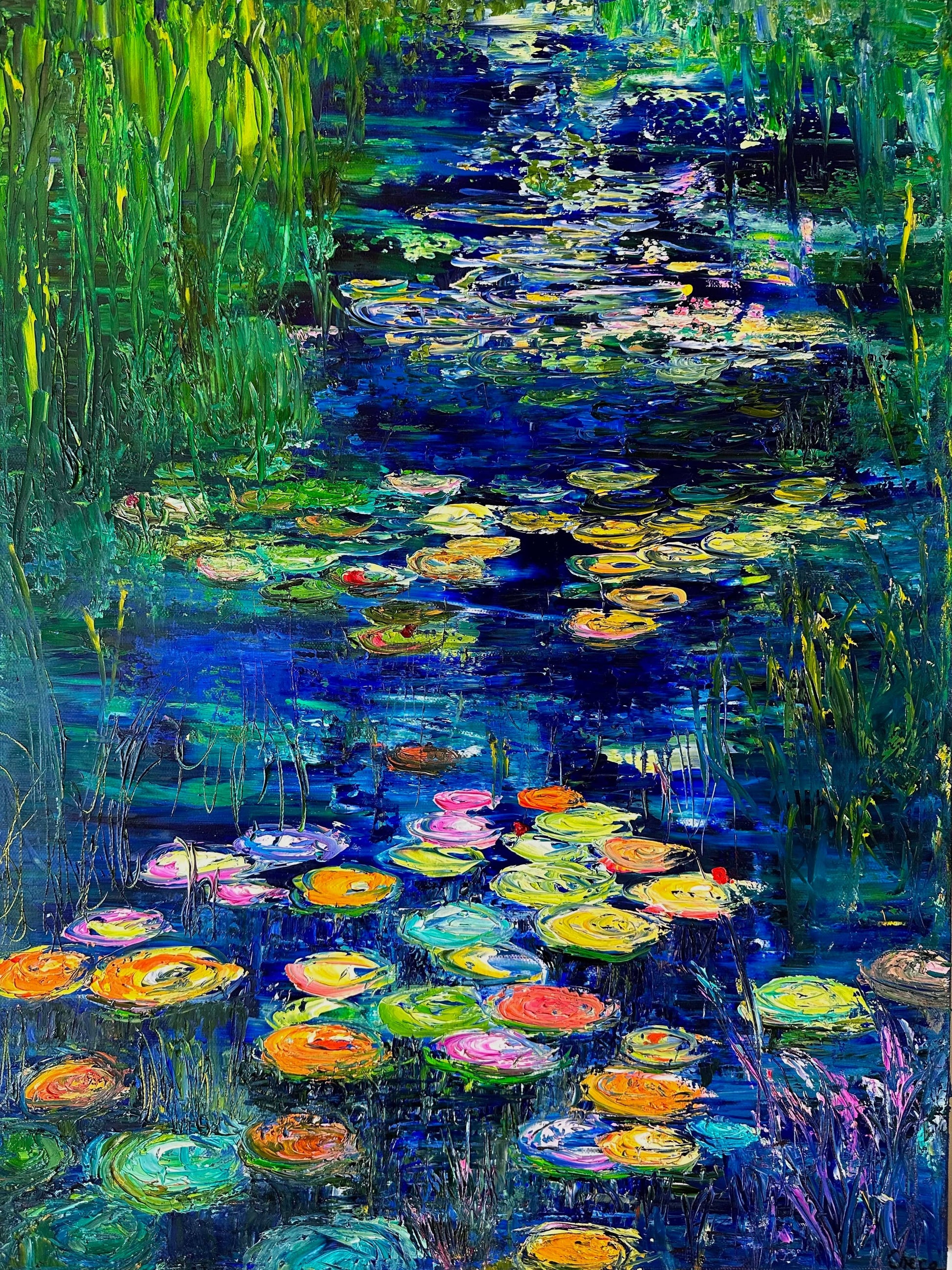 Blue Lily River fine art print by Maria-Victoria Checa featuring colorful lily pads floating on deep blue water.