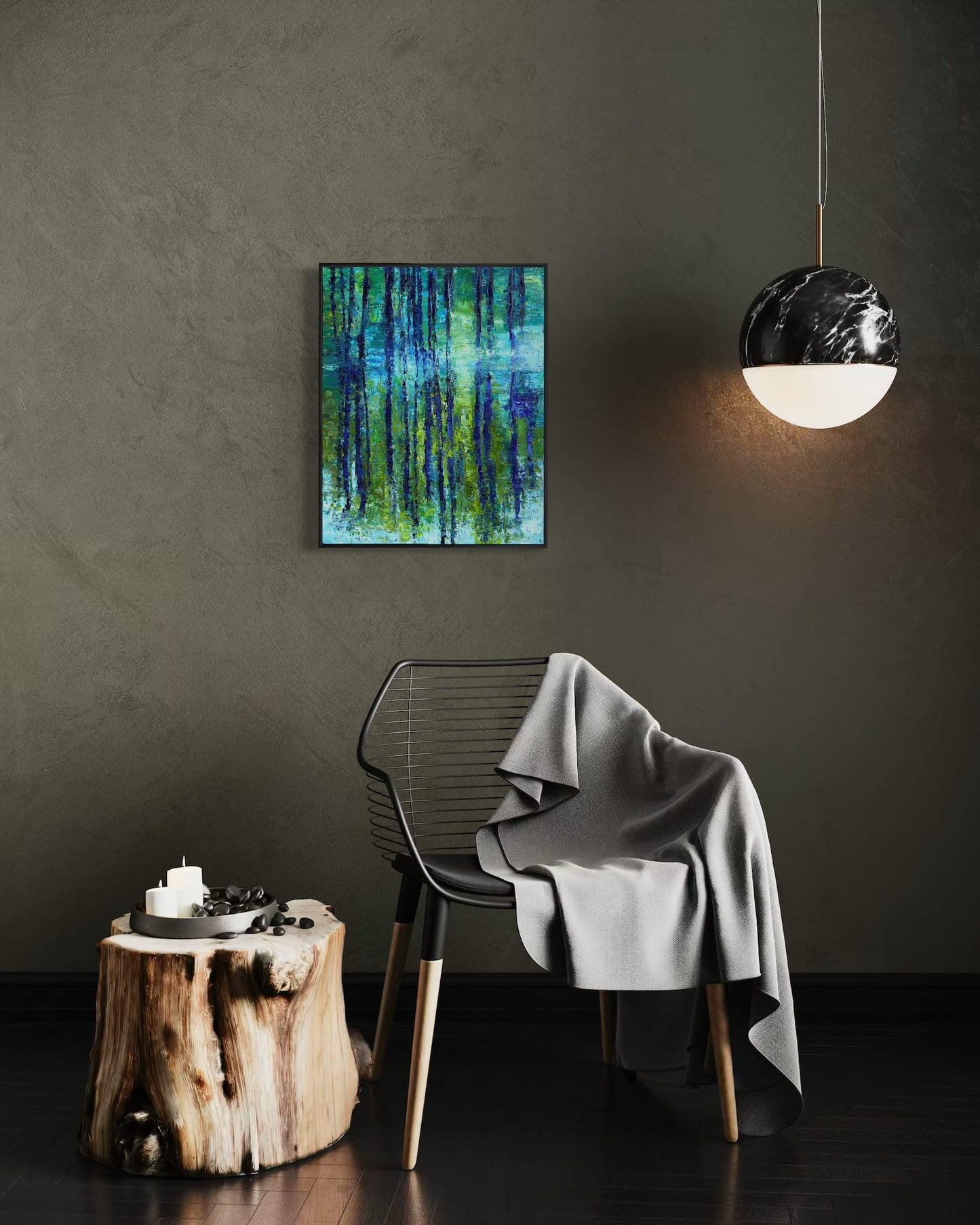 "By the Bayou" original impressionist oil painting by Maria-Victoria Checa in a black float frame on a dark textured wall, styled with a wire chair, natural wood stump side table, and marble pendant light.