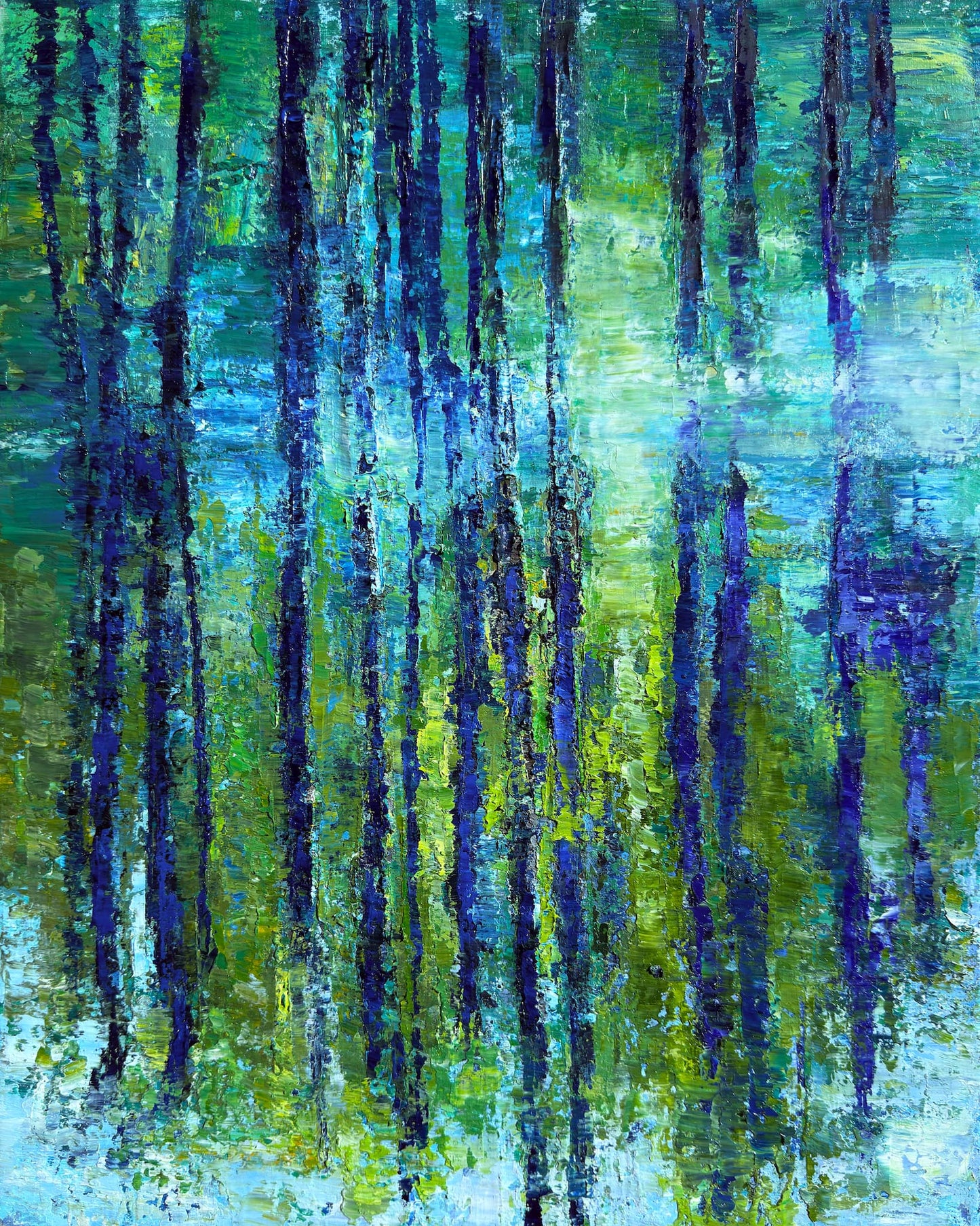 "By the Bayou," is a 16×20 original oil painting by Maria-Victoria Checa featuring heavily textured palette-knife strokes in cobalt blue, indigo, chartreuse, and aquamarine depicting abstract tree reflections on a bayou.