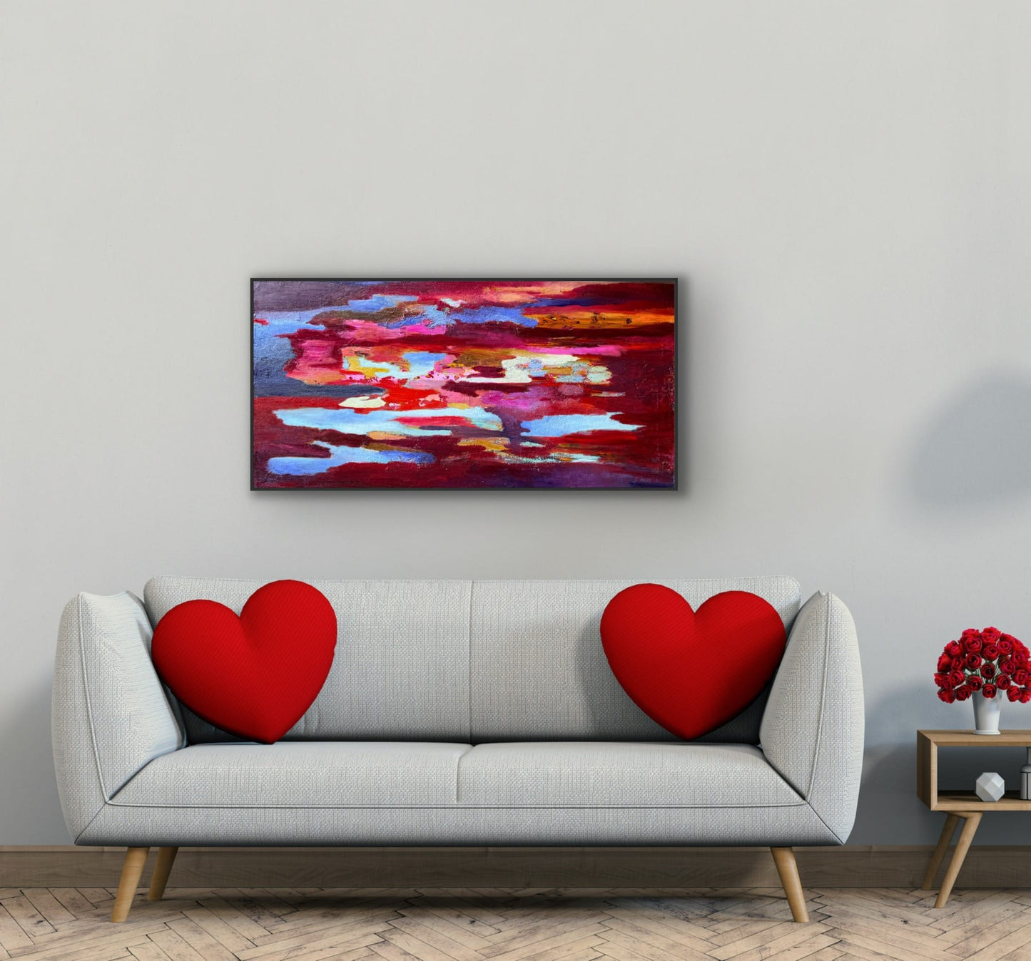 Colorama abstract painting hanging above a gray sofa in a modern living room — original art by Maria-Victoria Checa