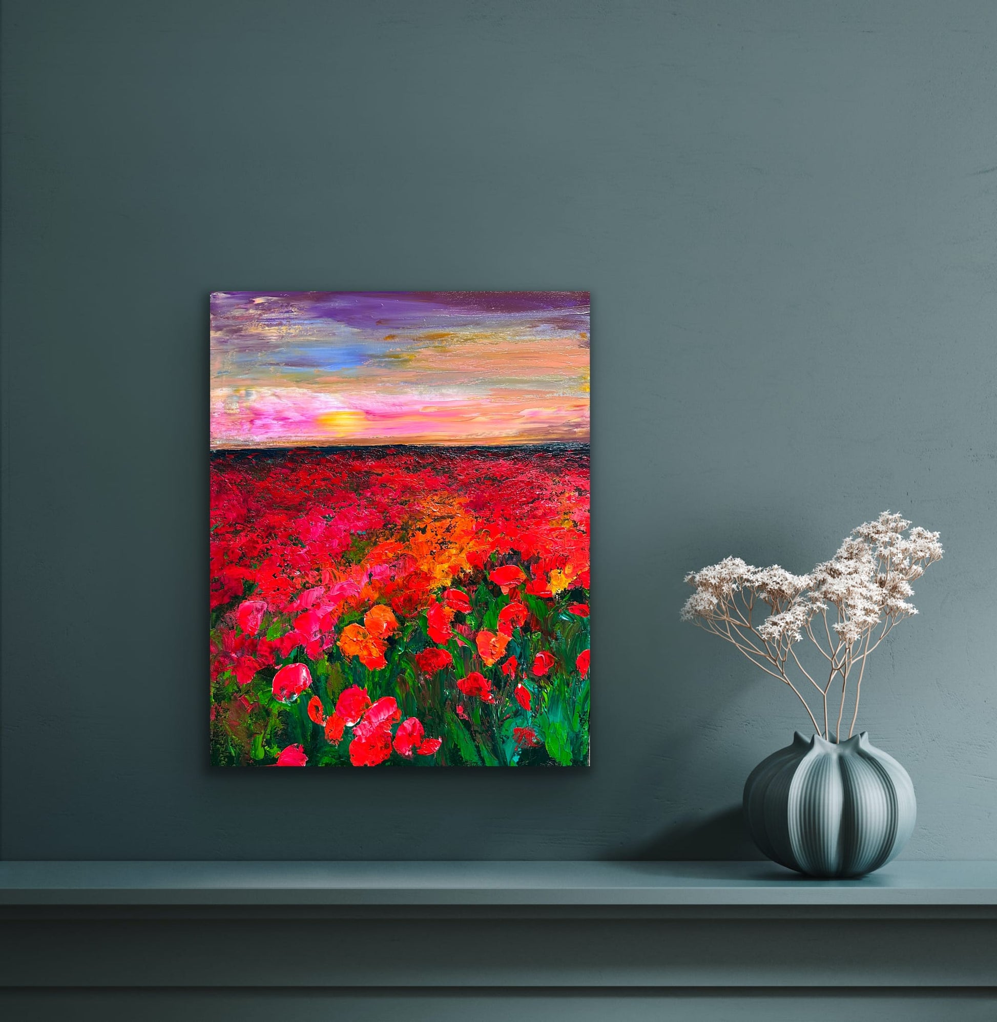 Fine art print of Coquelicots by Maria-Victoria Checa displayed on a teal wall with decorative vase