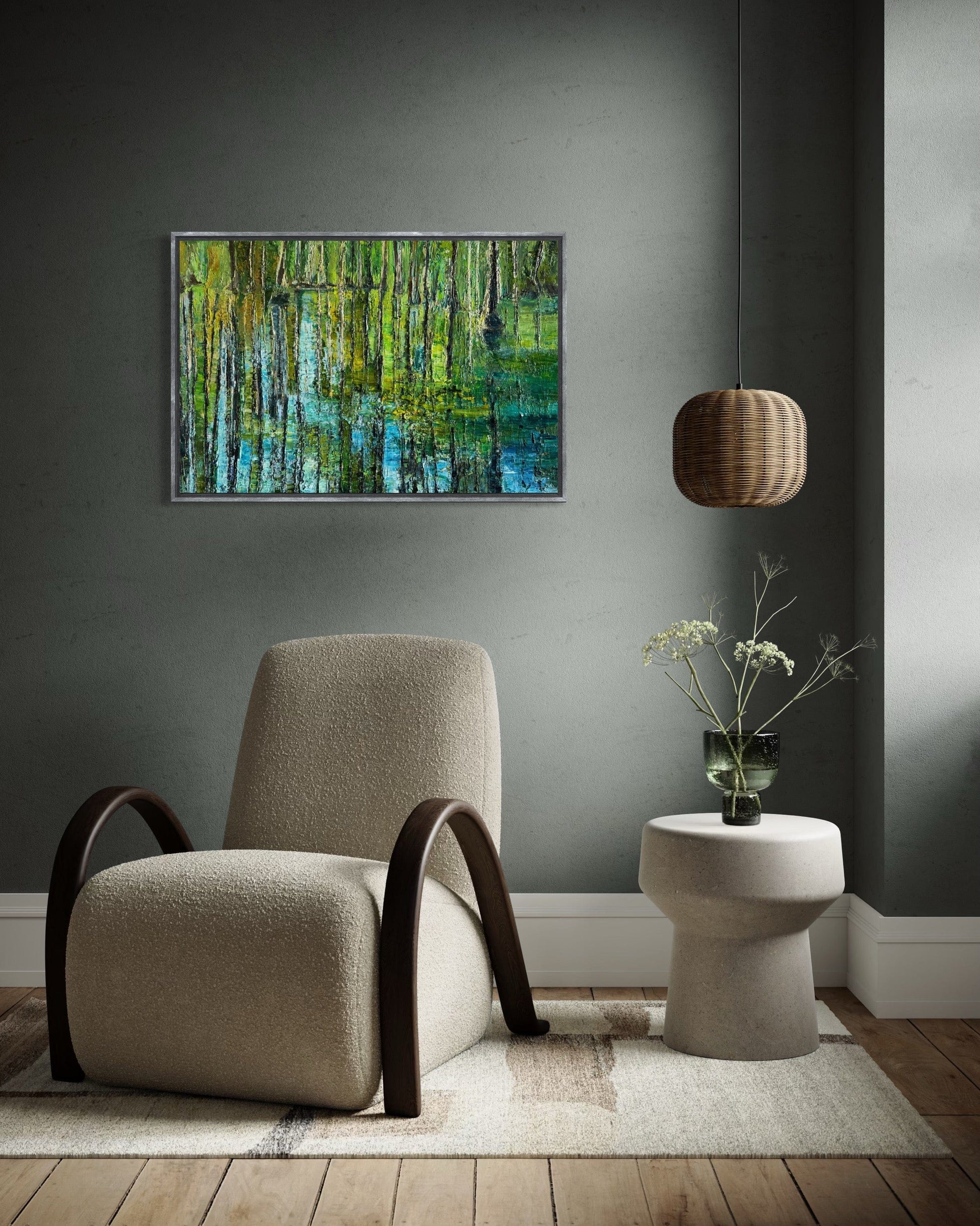 Modern interior with a beige armchair, impressionist painting by Maria-Victoria Checa. and side table.
