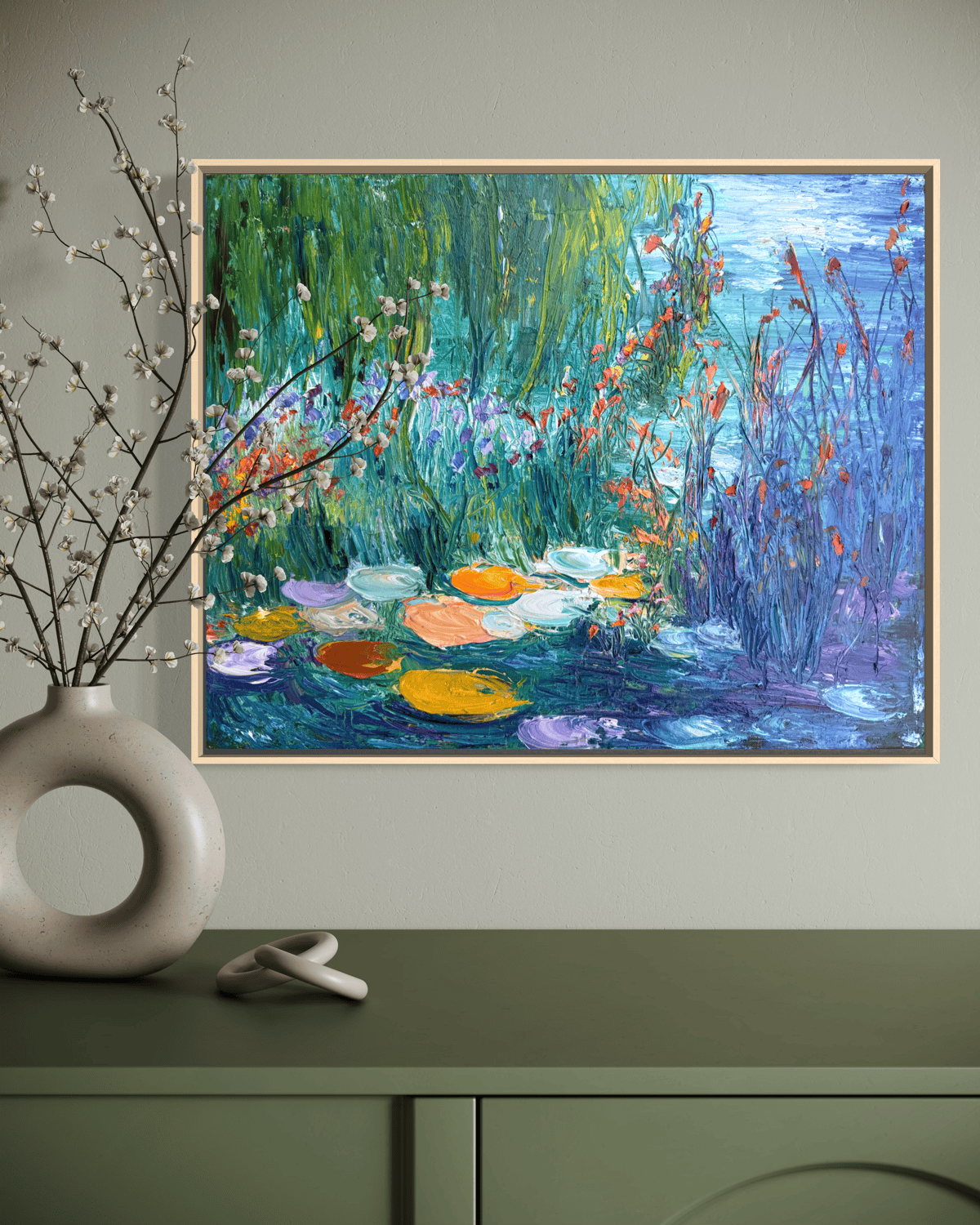 “Daydream” impressionist landscape painting displayed in a minimalist interior with soft green tones and botanical decor.