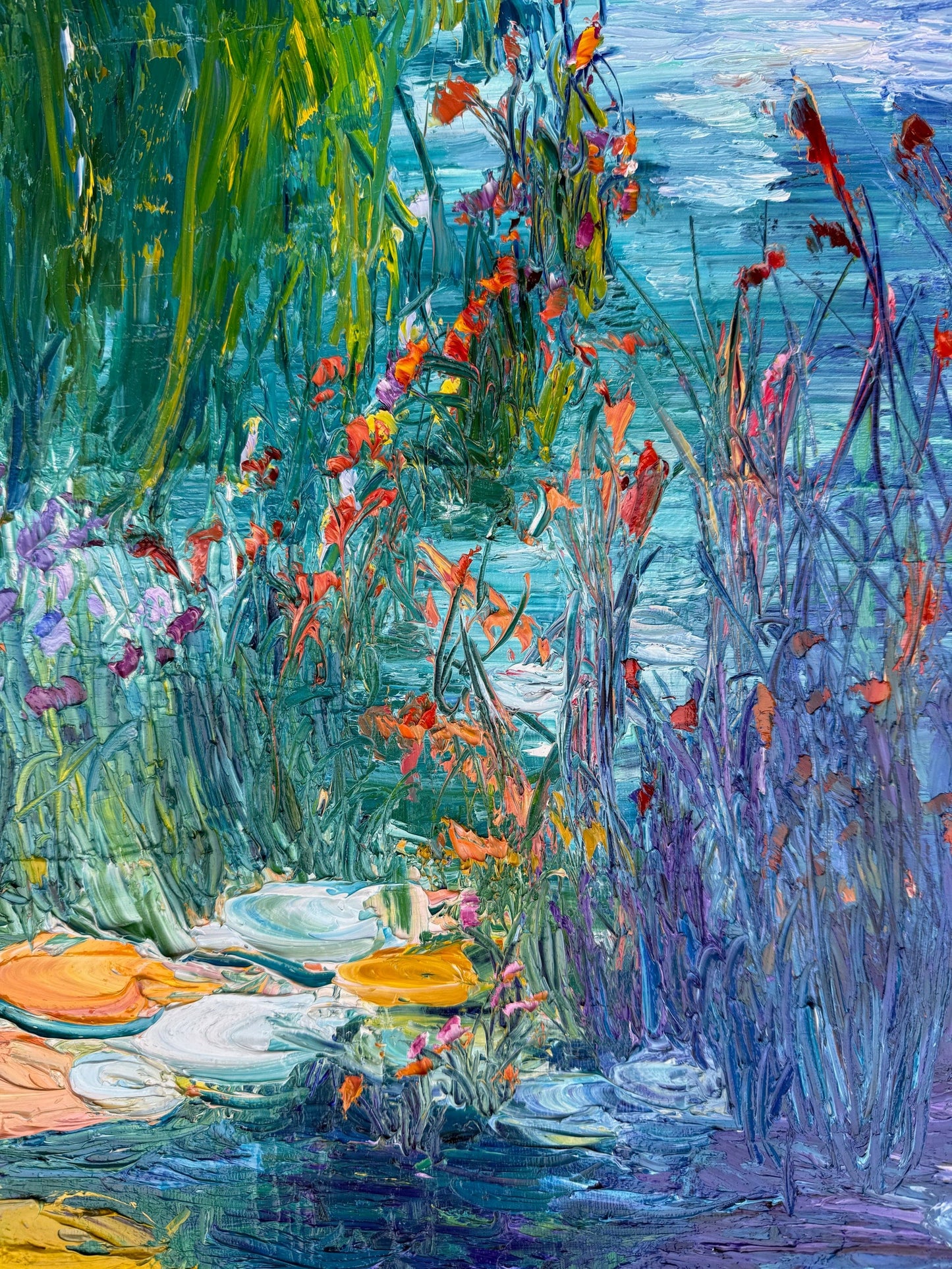 Detail of layered brushstrokes and colorful lily pads in “Daydream” by Maria-Victoria Checa.