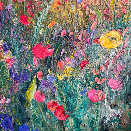 Close-up detail of Flower Field at Dusk by Maria-Victoria Checa showing thick palette knife texture on pink, red, yellow, and purple wildflowers amid rich teal and green foliage.