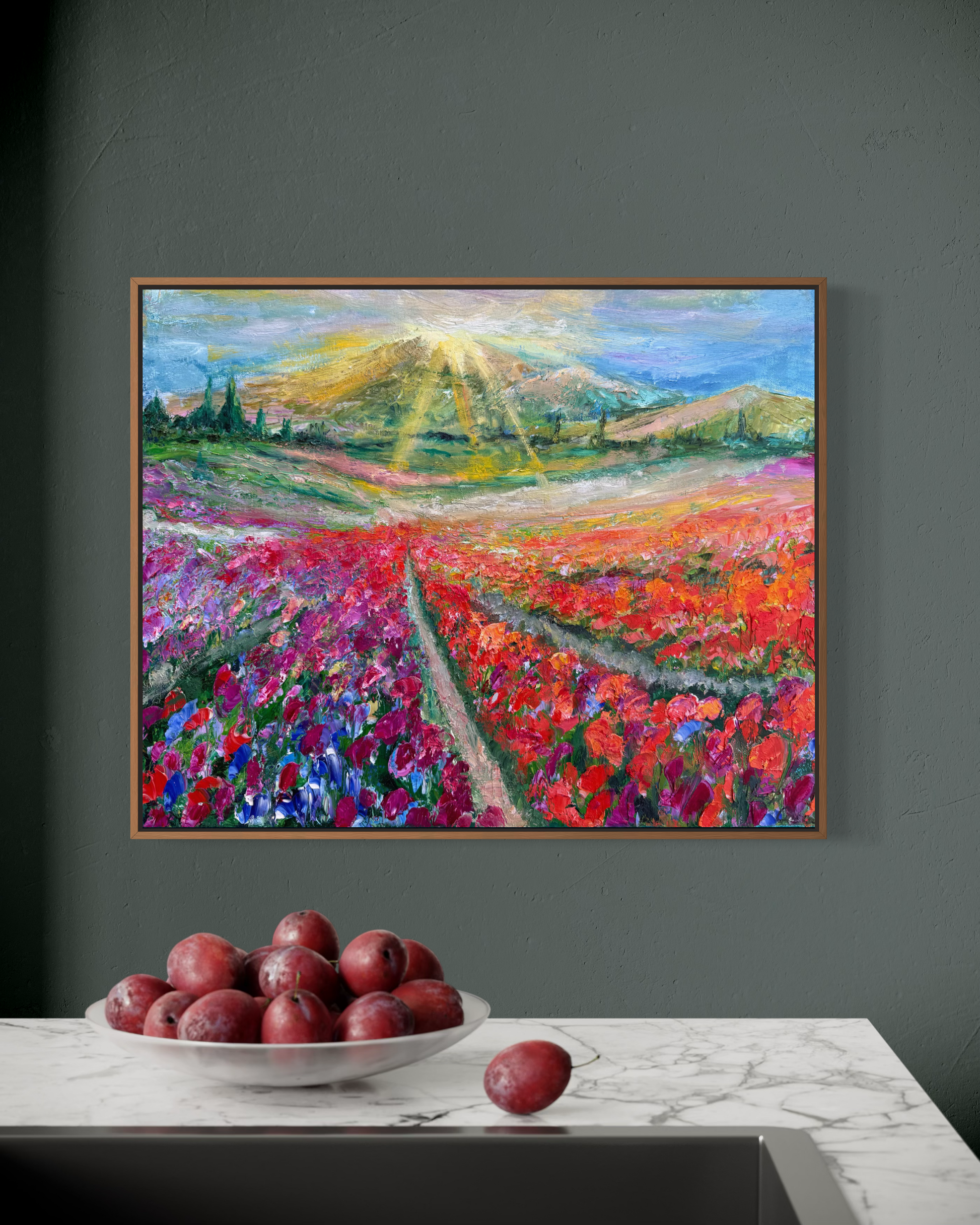 ‘Flower Rows’ fine art painting by Maria-Victoria Checa hanging above a marble countertop with a bowl of plums.