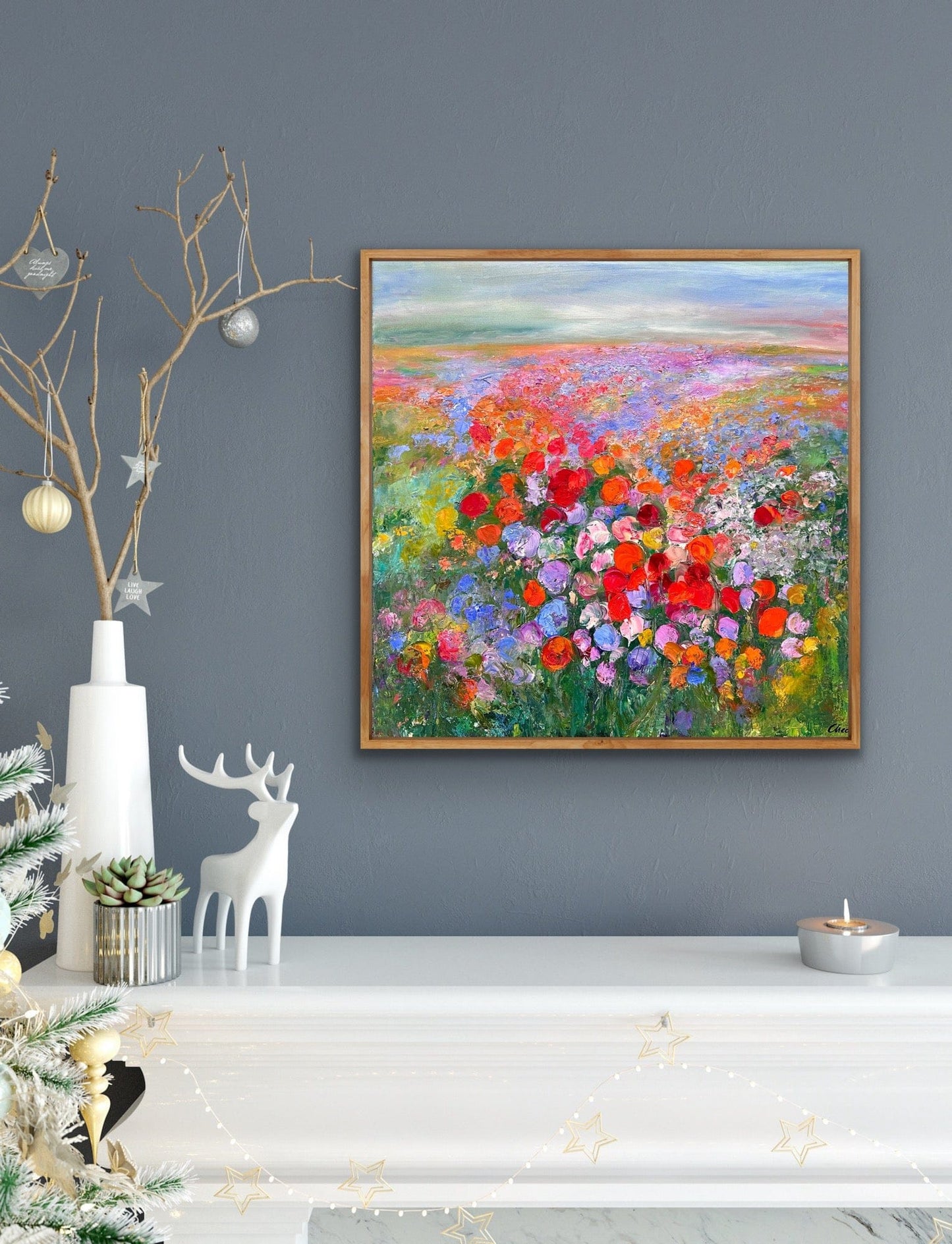 Prairie impressionist flower field painting displayed above mantle by Maria-Victoria Checa