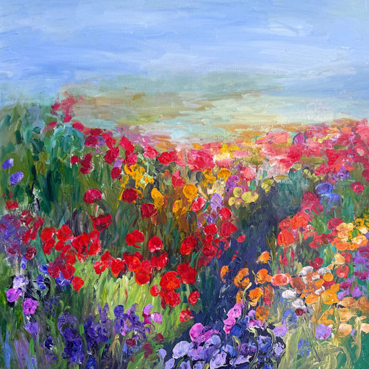 Path in the Meadow impressionist landscape painting by Maria-Victoria Checa featuring a winding path through a vibrant wildflower meadow in red, orange, yellow, purple, and pink blooms under a soft blue sky.