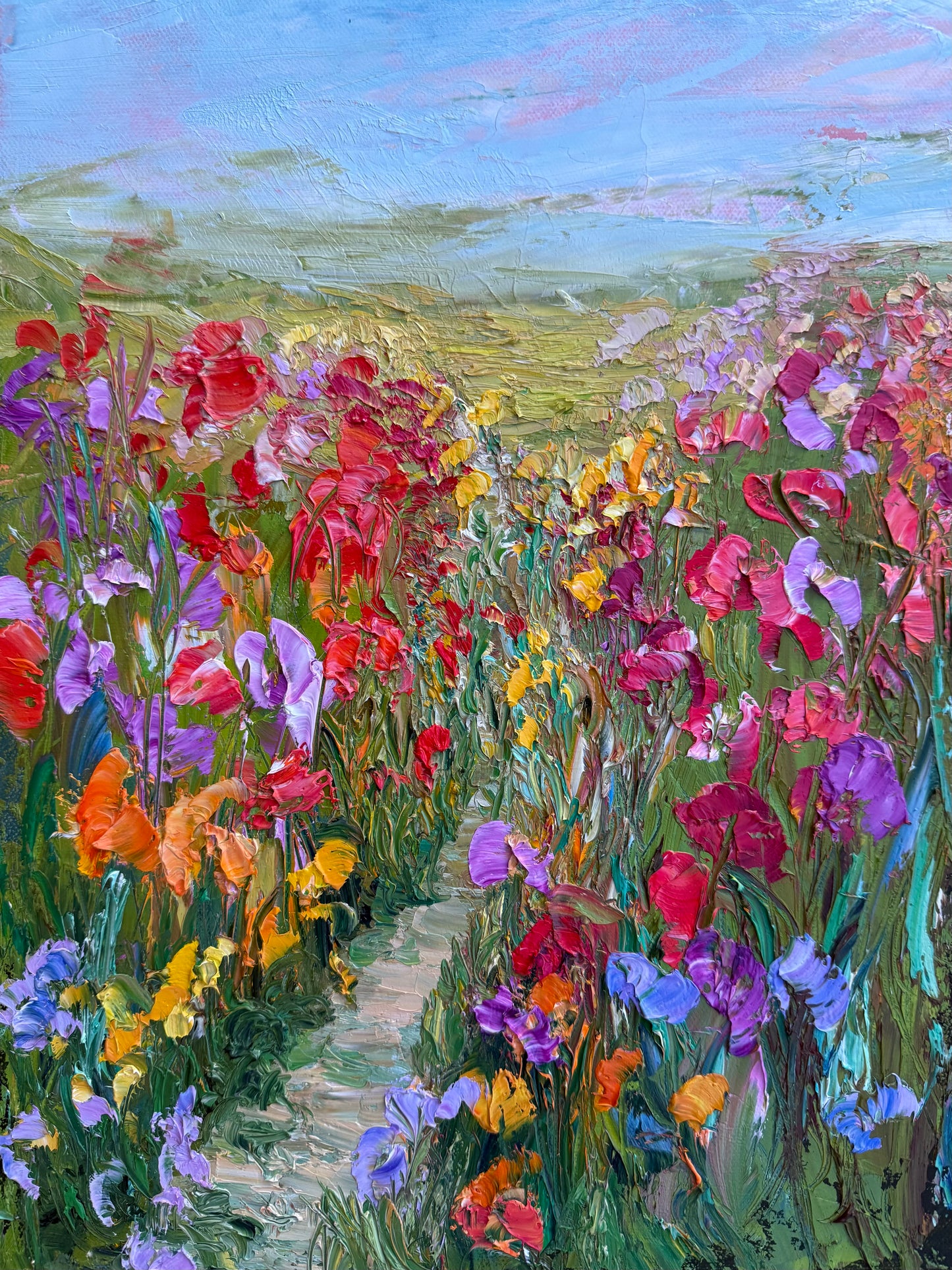 Original impressionist landscape painting “Path Through Flower Field” by Maria-Victoria Checa featuring a winding path through a colorful flower field.