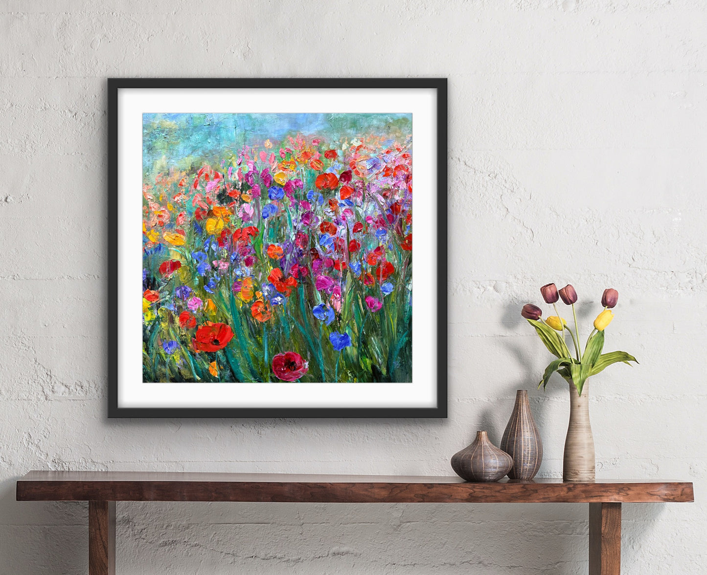 Multi-Colored Flower Field framed paper print displayed over console table by Maria-Victoria Checa