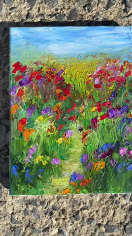 Video of A Walk in a Flower Field showing textured brushstrokes and vibrant red, purple, and yellow wildflowers.