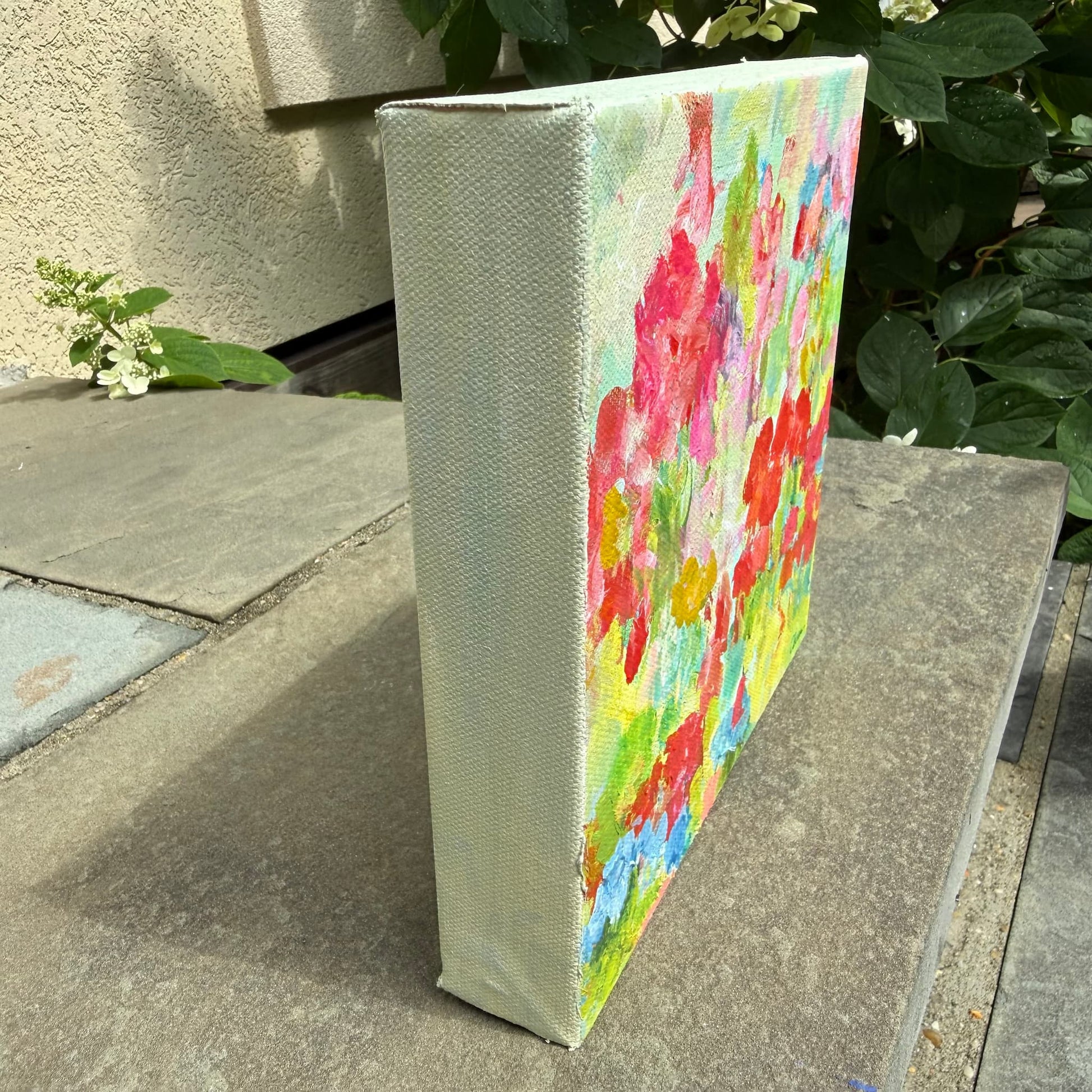 Side angle view of Rose Meadow original acrylic painting showing canvas edge and texture, by Maria-Victoria Checa, Miniature Impressions No. 2