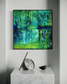 Sanctuary canvas print by Maria-Victoria Checa displayed on a modern marble console with sculptural objects.