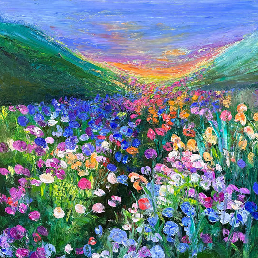 Impressionist landscape painting by Maria-Victoria Checa of a colorful wildflower meadow with rolling green hills.