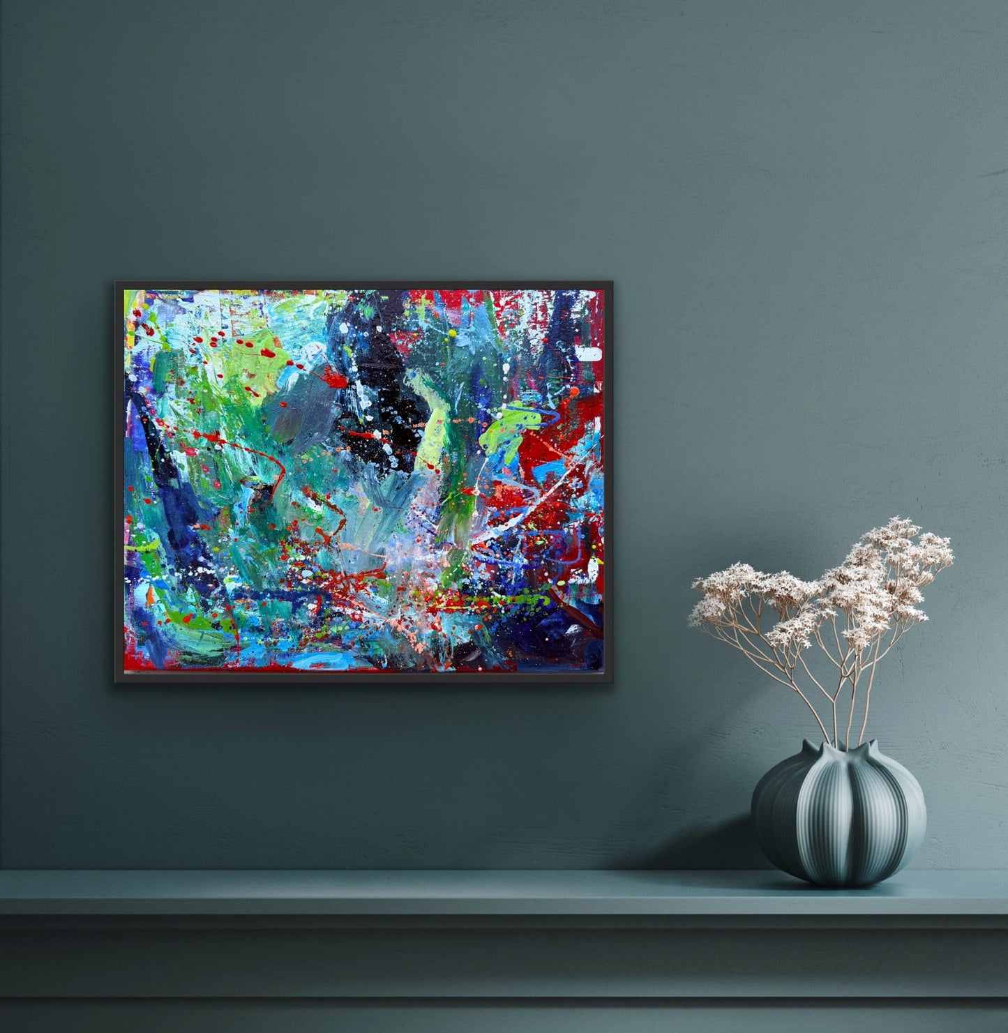 Stardust, original abstract acrylic painting by Maria-Victoria Checa, displayed on a dark teal wall