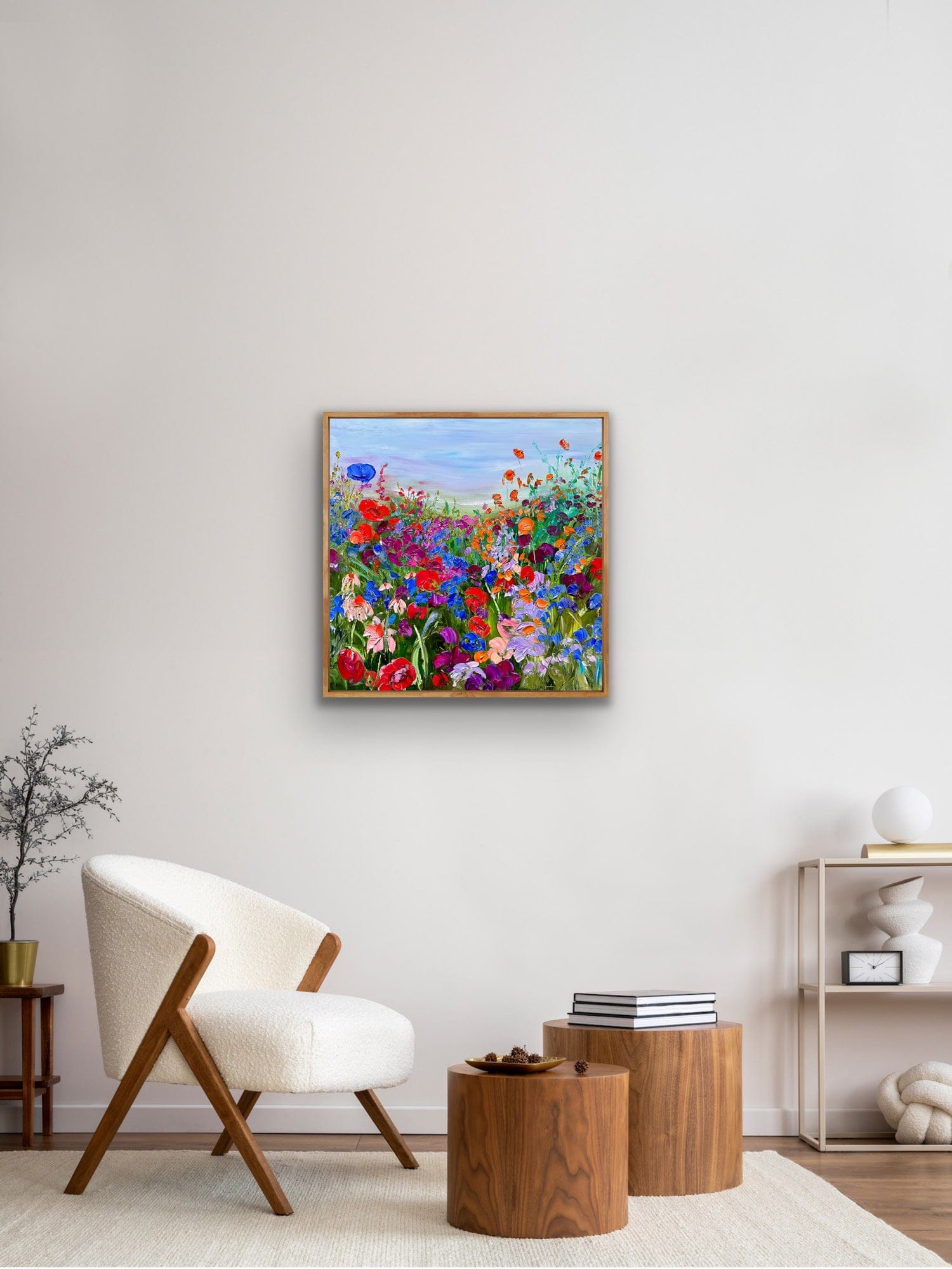 Summer Reverie framed canvas print by Maria-Victoria Checa in a natural wood float frame displayed on a white wall in a bright modern living room setting