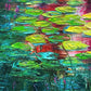Close-up detail of Sunset Lilies by Maria-Victoria Checa showing thick palette knife texture on green and yellow lily pads floating over deep teal water with magenta and orange sunset reflections