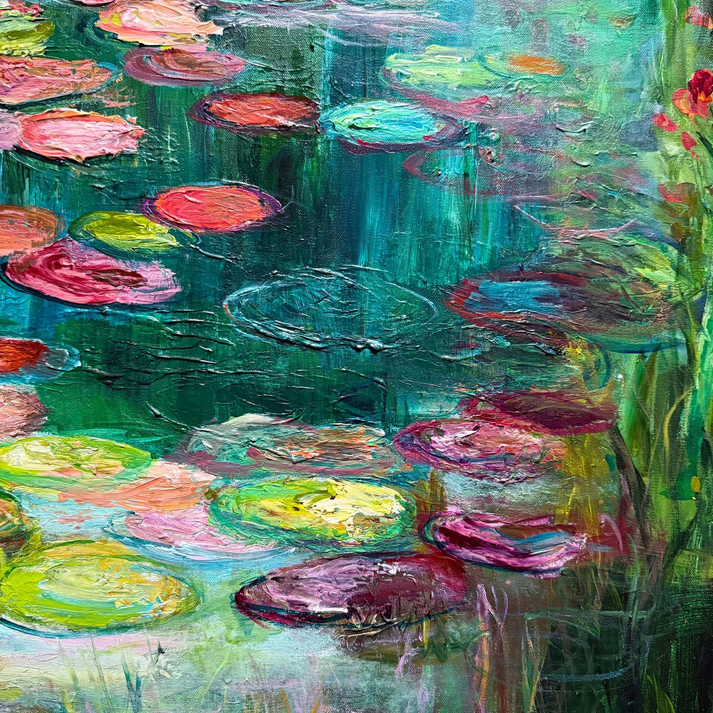 Close-up detail of Waterlily Garden, an impressionist water reflection painting by Maria-Victoria Checa featuring vibrant lily pads and textured teal-green water.