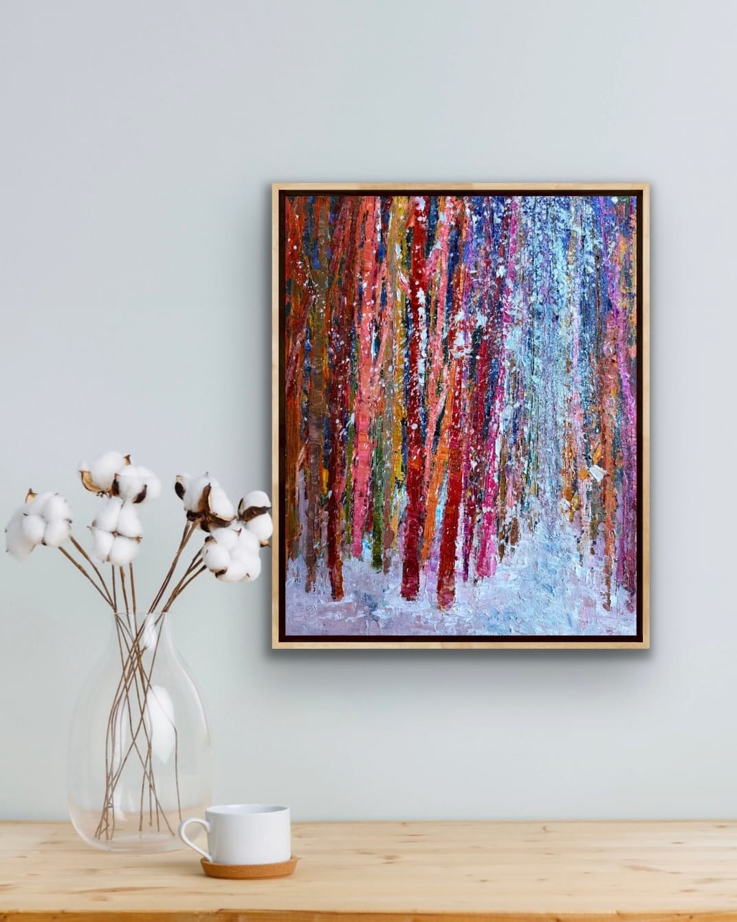 Winter Land Path colorful abstract forest oil painting by Checa Art displayed in a modern interior with dried cotton stems