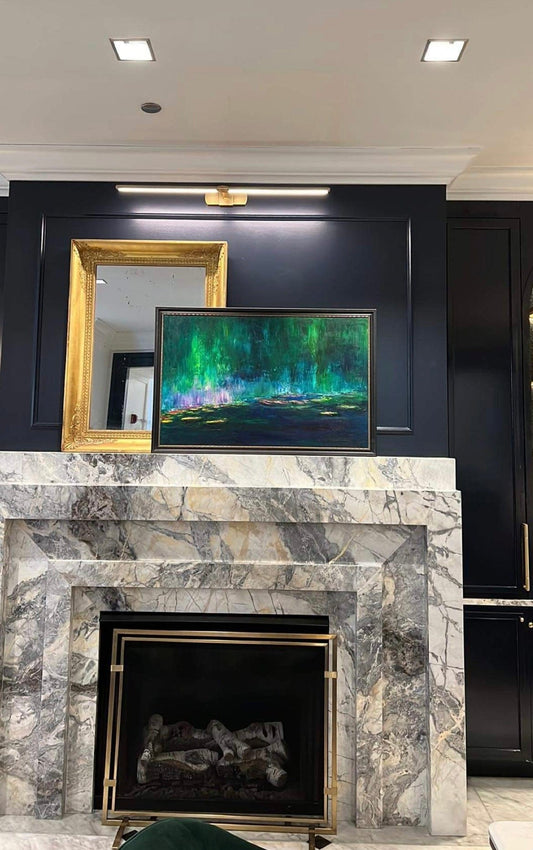 Fairy's Cove II water lily painting by Maria-Victoria Checa installed above marble fireplace at Waldorf Astoria Chicago